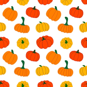 Seamless pattern with orange colored autumnal pumpkins