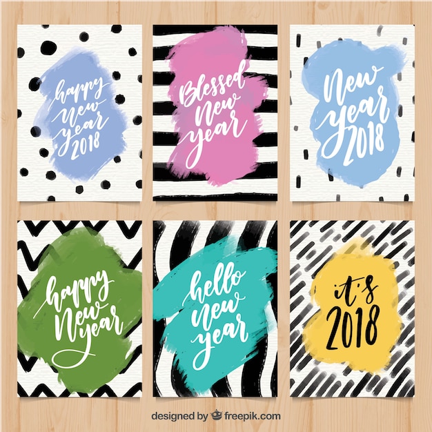 Free vector set of abstract watercolor new year cards