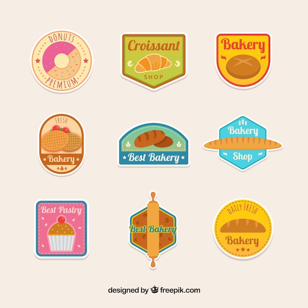 Free vector set of bakery stickers in flat style