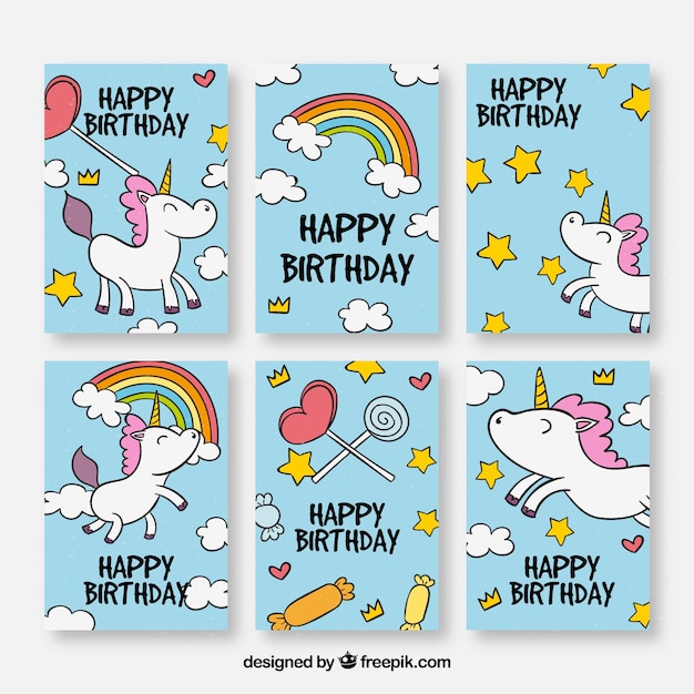 Set di cartoline di compleanno con unicorns disegnati a mano