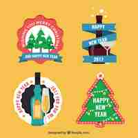 Free vector set of christmas stickers in flat design