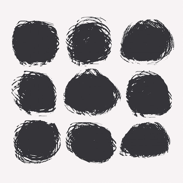 Free vector set of circular grunge or paint stains