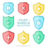 Set of colored shields in flat design