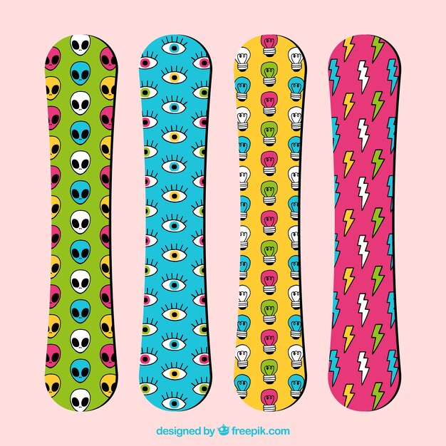 Set of colored snowboards with drawings