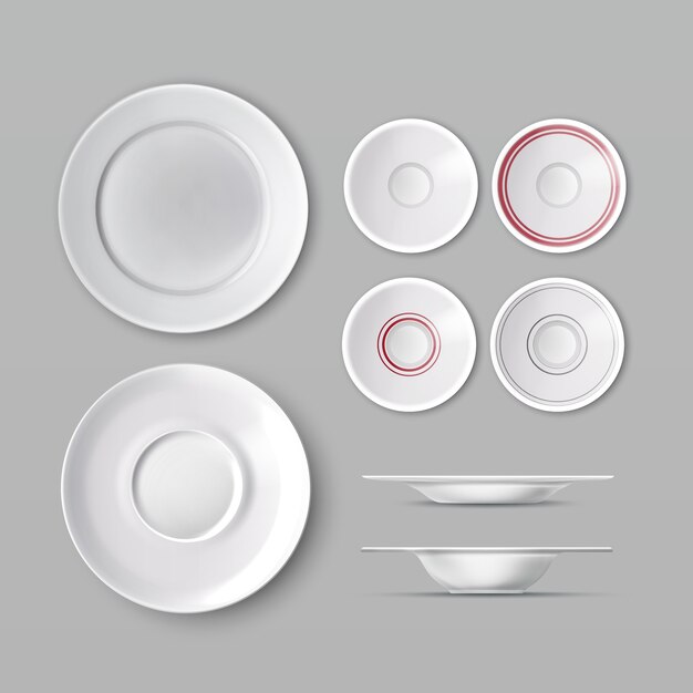 set of dishware with white empty plates