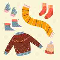 Free vector set of drawn cozy winter clothes and essentials