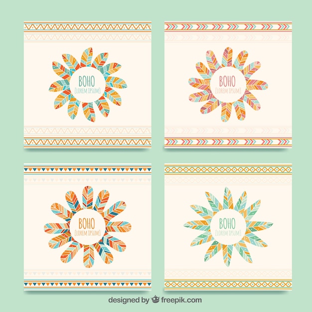 Free vector set of four boho cards with colored feathers