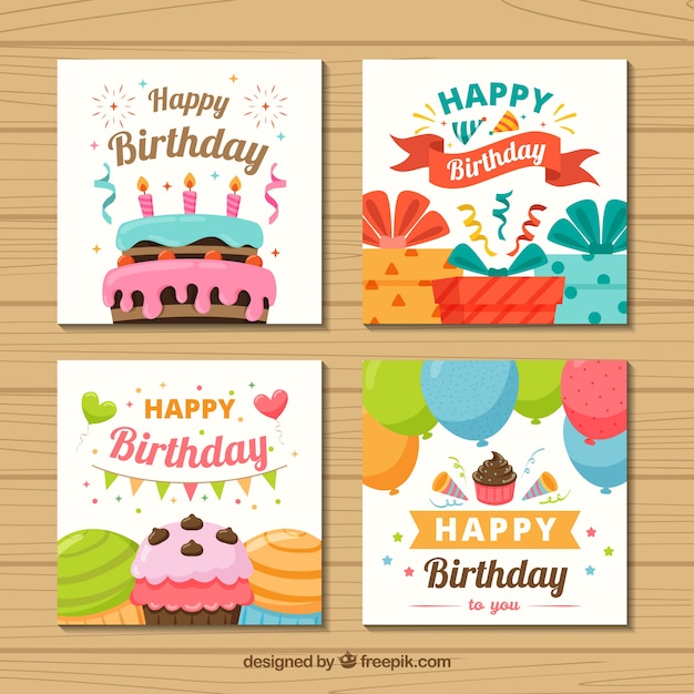 Free vector set of four colourful birthday cards in flat design