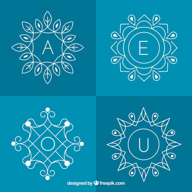 Set di quattro monogrammi floreali