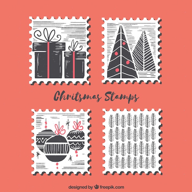 Free vector set of four hand drawn christmas stamps