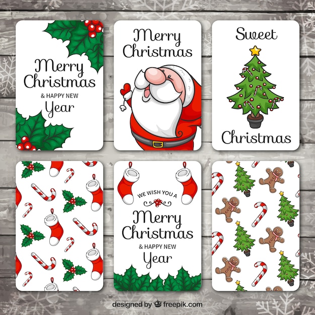 Free vector set of hand drawn christmas and new year cards