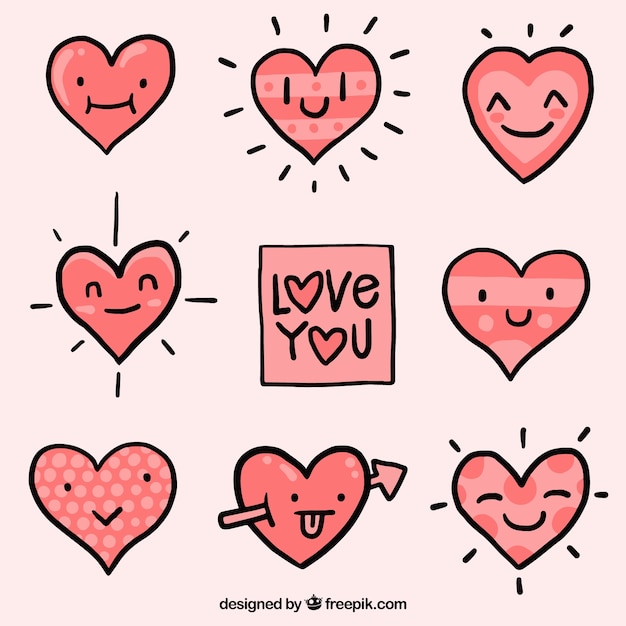 Free vector set of hand drawn hearts with faces