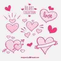 Free vector set of hand drawn pink hearts