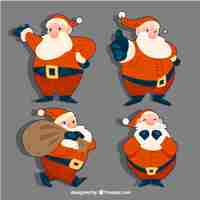 Free vector set of hand-drawn santa claus stickers