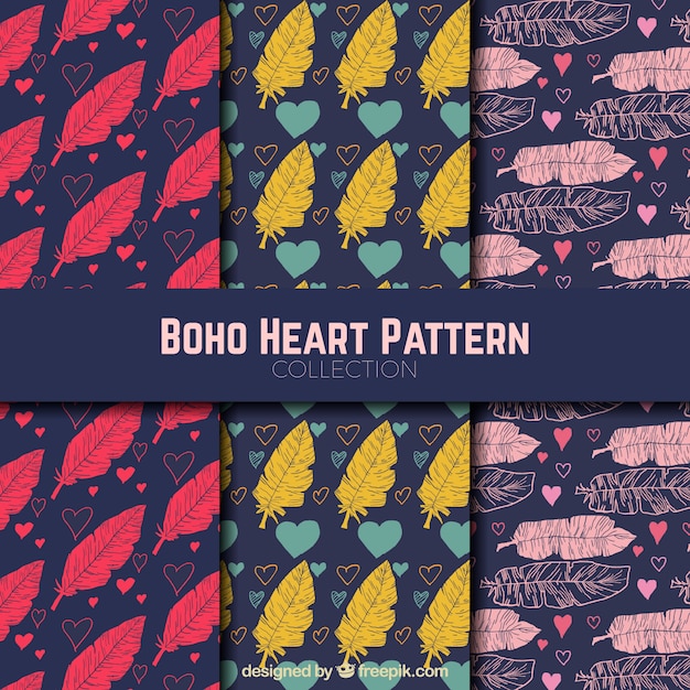 Set of hearts patterns with hand drawn feathers