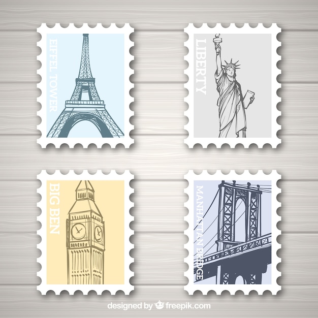 Vettore gratuito set di francobolli punto di riferimento con diverse città in mano disegnato stile