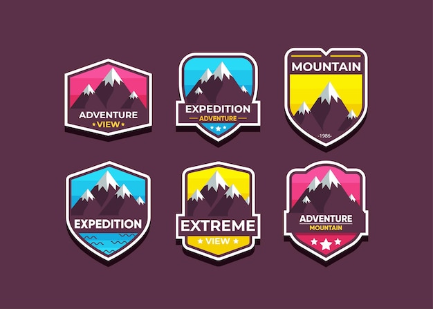 Vettore gratuito imposta il logo e i distintivi della montagna.