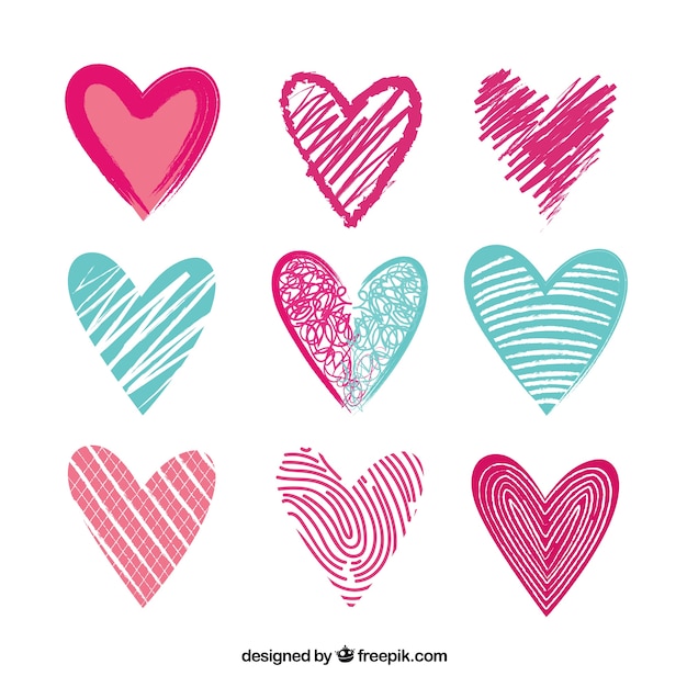 Бесплатное векторное изображение Набор ручных краски сердца