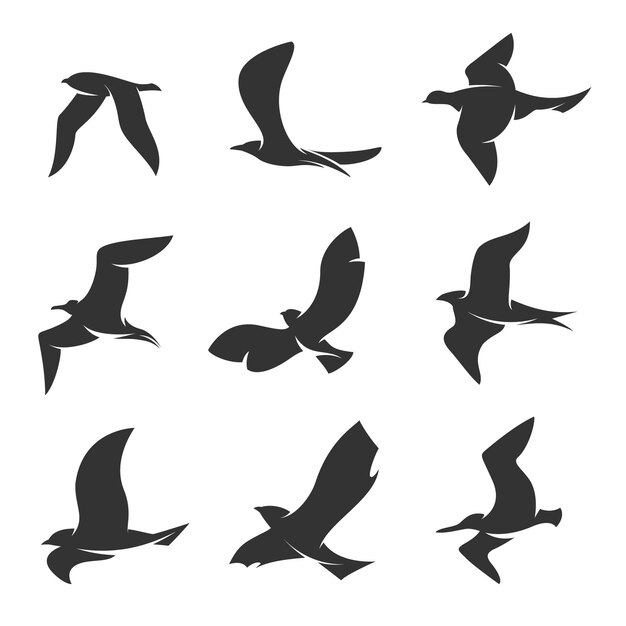 飛ぶ鳥のシルエットコレクション 無料のベクター