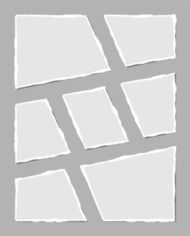 Набор порванной белой записки. обрывки рваной бумаги различной формы, изолированные на сером фоне. векторная иллюстрация.