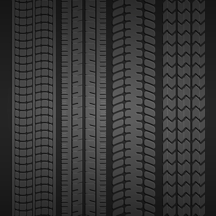 Free Vector set of prints from different types of tires on a dark gray background. vector illustration
