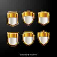 Free vector set of shiny golden shields