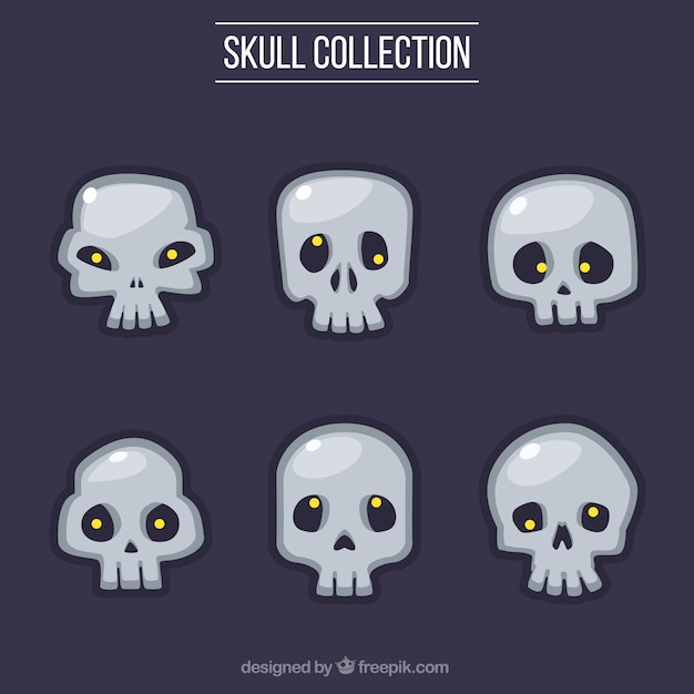 Set of skulls with yellow eyes