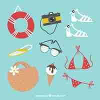 Free vector set of summer clothes and elements in flat style