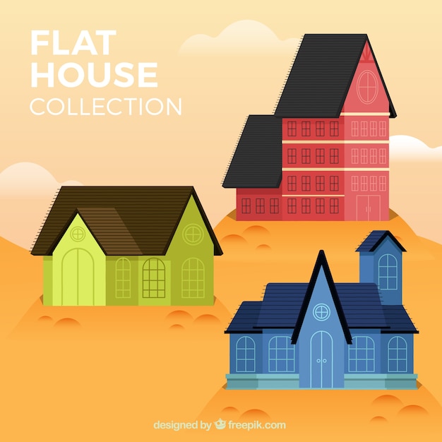 Набор из трех цветных домов в плоском дизайне
