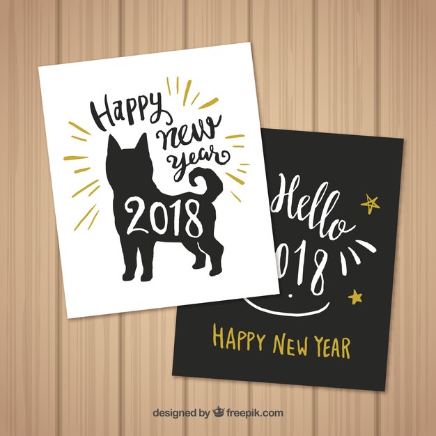 Set of two hand drawn new year cards with a dog