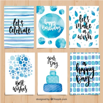 Set of watercolor birthday cards in blue tones