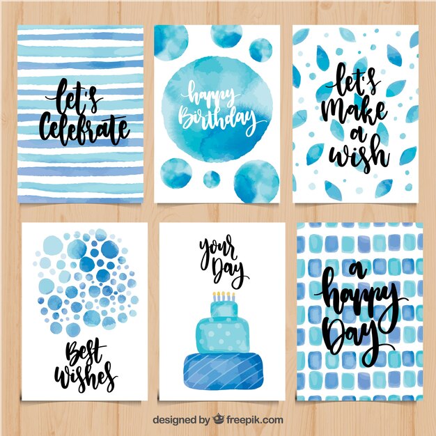 Set of watercolor birthday cards in blue tones