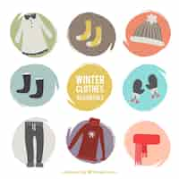 Free vector set of winter accessories and hand-drawn pretty clothes