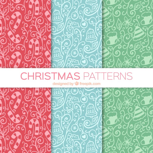 Several hand drawn ornamental patterns with christmas elements  