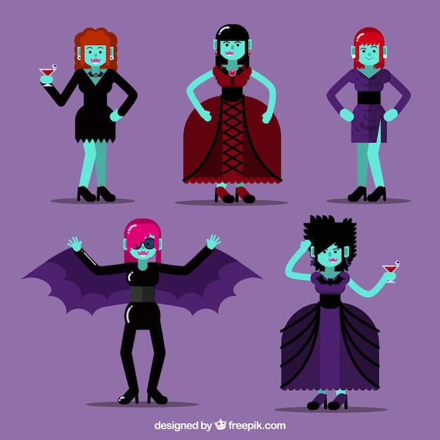 Free vector several vampires in flat design