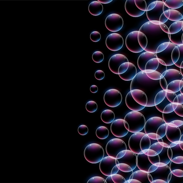 Shiny bubbles on black background with text space