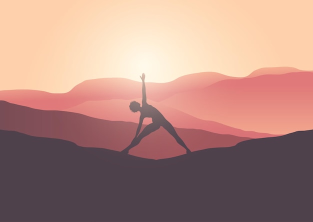 Silhouette of a female in yoga pose in a sunset landscape