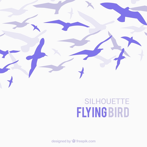 Free vector silhouette flying bird background