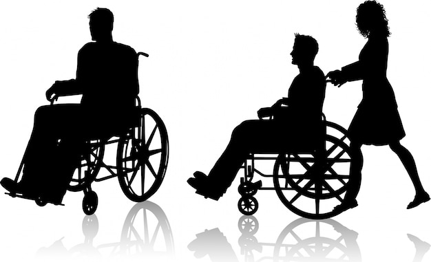Silhouette di un uomo in una sedia a rotelle e una con una donna spingendolo