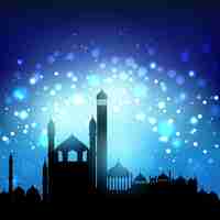 Vettore gratuito silhouette di moschee contro un cielo di notte bokeh luci