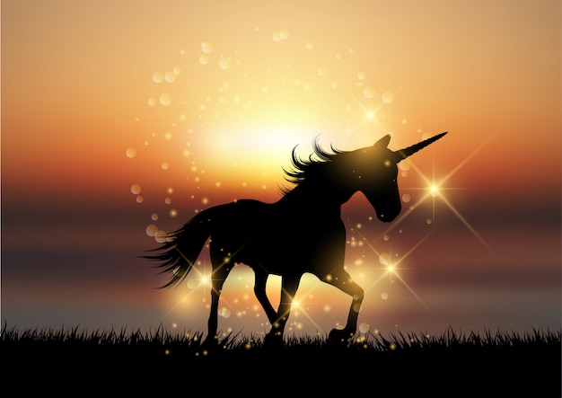 Silhouette of a unicorn in a sunset landscape