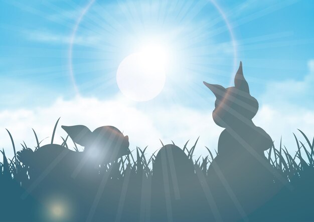 silhouettes of bunnies against a blue sunny sky illustration