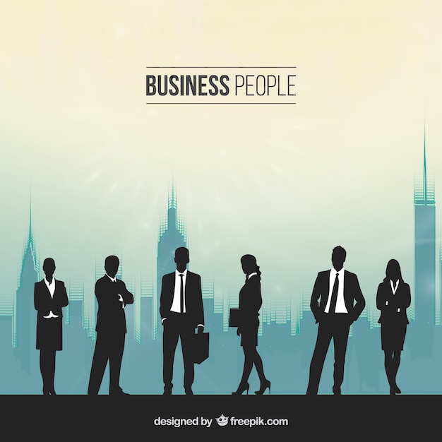 Silhouettes of people in a busy office