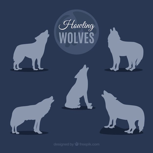 Silhouettes of wolves howling