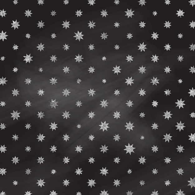 Silver foil star pattern on a chalkboard texture