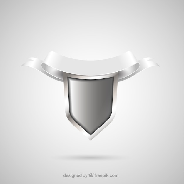 Silver shield with ornamental ribbon