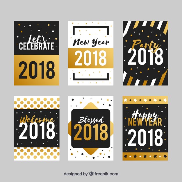 金色の要素を持つシンプルなフラットな新年のカード