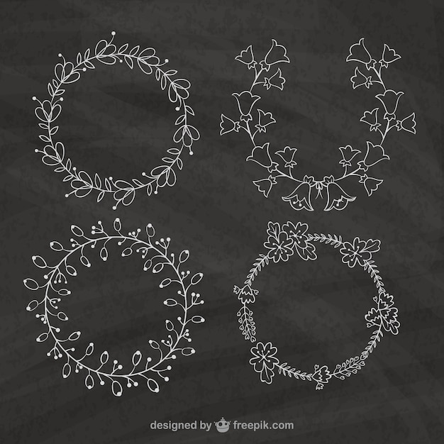 Sketchy floral wreaths in blackboard