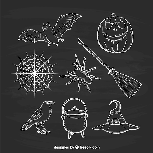 Free vector sketchy halloween elements on blackboard