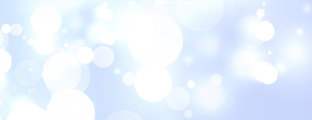 Free vector sky blue background with bokeh light effect